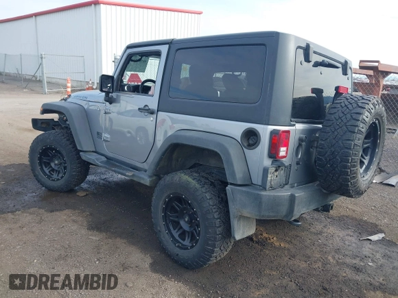 2013 Jeep Wrangler Rubicon 10th Anniversary with VIN 1C4BJWCG8DL639121, listed as a IAAI auction lot 40561773 with 56,023 mi miles and . Bid and sale history available at DreamBid. Image 3.