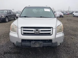 2007 Honda Pilot EX with VIN 2HKYF184X7H511937, listed as a IAAI auction lot 40992172 with 250,940 mi miles. Bid and sale history available at carsss.com. Image 13.