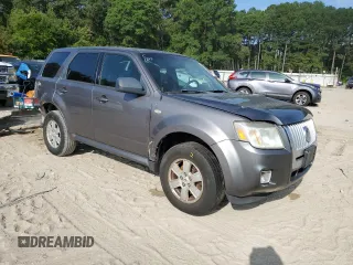 2009 Mercury Mariner with VIN 4M2CU81G69KJ18657, listed as a Copart auction lot 68869154 with 186,290 mi miles and Salvage title. Bid and sale history available at DreamBid. Image 4.