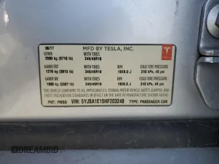 2017 Tesla Model S 60 with VIN 5YJSA1E15HF203248, listed as a Copart auction lot 54923855 with 84,214 mi miles and Salvage title. Bid and sale history available at DreamBid. Image 12.