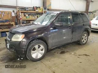2009 Suzuki Grand Vitara z VIN JS3TD042894100397, wystawiony jako Copart lot #45415585 z przebiegiem 158 782 mil mil oraz Szkoda całkowita • Salvage title. Historia ofert i sprzedaży dostępna na DreamBid. Obrazek 1.