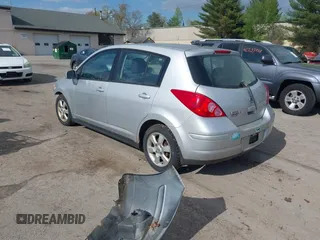 2009 Nissan Versa S with VIN 3N1BC13EX9L413558, listed as a IAAI auction lot 42198891 with 158,311 mi miles and . Bid and sale history available at DreamBid. Image 3.