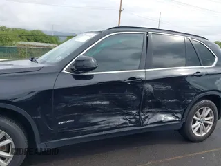 2014 BMW X5 xDrive35i z VIN 5UXKR0C51E0K50875, wystawiony jako IAAI lot #41807040 z przebiegiem 59 967 mil mil oraz . Historia ofert i sprzedaży dostępna na DreamBid. Obrazek 6.