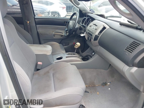 2009 Toyota Tacoma with VIN 3TMLU42N69M032320, listed as a IAAI auction lot 42280196 with 214,720 mi miles and . Bid and sale history available at DreamBid. Image 5.