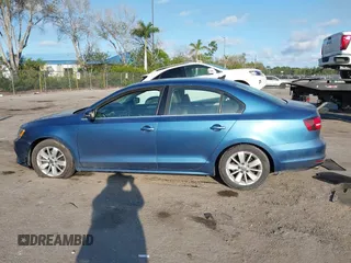 2016 Volkswagen Jetta Sedan 1.4T SE with VIN 3VWD67AJ0GM328412, listed as a IAAI auction lot 41556254 with 137,814 mi miles. Bid and sale history available at carsss.com. Image 14.