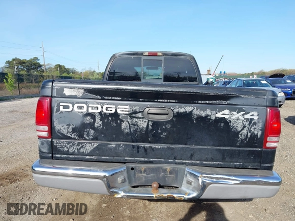 1999 Dodge Dakota SLT with VIN 1B7GG22X8XS115282, listed as a IAAI auction lot 42136576 with 220,465 mi miles and . Bid and sale history available at carsss.com. Image 16.