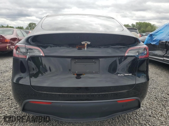 2021 Tesla Model Y Long Range with VIN 5YJYGDEE2MF243763, listed as a Copart auction lot 54941665 with 39,516 mi miles and Clean Title. Bid and sale history available at DreamBid. Image 6.