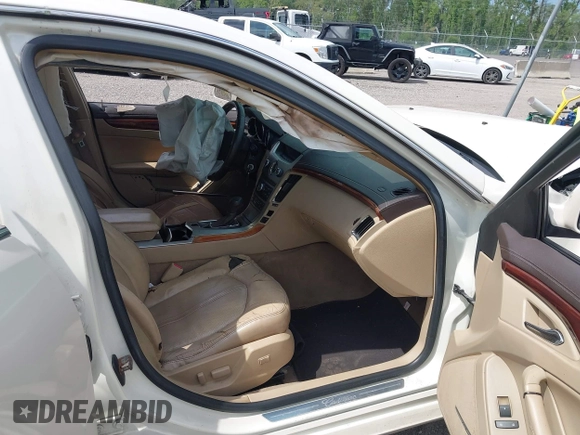 2009 Cadillac CTS RWD z VIN 1G6DF577390175097, wystawiony jako IAAI lot #42359549 z przebiegiem 217 286 mil mil oraz . Historia ofert i sprzedaży dostępna na DreamBid. Obrazek 5.
