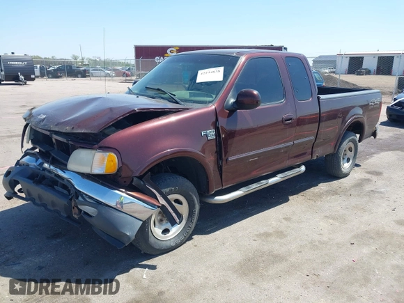 2000 Ford F-150 XL with VIN 1FTRX18L5YNA99713, listed as a IAAI auction lot 42194838 with Not provided miles and . Bid and sale history available at DreamBid. Image 2.