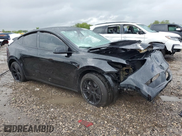 2024 Tesla Model Y z VIN 7SAYGDED7RF018059, wystawiony jako Copart lot #54273785 z przebiegiem 30 080 mil mil oraz Szkoda całkowita • Salvage title. Historia ofert i sprzedaży dostępna na DreamBid. Obrazek 4.