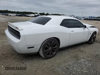 2014 Dodge Challenger SRT-8 z VIN 2C3CDYCJ1EH258264, wystawiony jako Copart lot #75100064 z przebiegiem 105 432 mil mil oraz Szkoda całkowita • Salvage title. Historia ofert i sprzedaży dostępna na DreamBid. Obrazek 3.