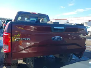 2015 Ford F-150 XLT w/HD Payload Pkg with VIN 1FTFW1EG9FFC44739, listed as a IAAI auction lot 41193582 with 121,169 mi miles. Bid and sale history available at carsss.com. Image 16.