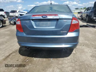 2012 Ford Fusion SEL z VIN 3FAHP0JG7CR297174, wystawiony jako Copart lot #55469005 z przebiegiem 129 434 mil mil oraz Szkoda całkowita • Salvage title. Historia ofert i sprzedaży dostępna na DreamBid. Obrazek 6.