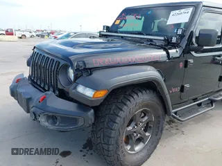 2021 Jeep Gladiator Rubicon z VIN 1C6JJTBG6ML535939, wystawiony jako IAAI lot #42260764 z przebiegiem 114 060 mil mil oraz . Historia ofert i sprzedaży dostępna na DreamBid. Obrazek 18.