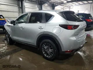 2019 Mazda CX-5 Touring with VIN JM3KFACM4K1552732, listed as a Copart auction lot 48226525 with 125,429 mi miles and Salvage Title. Bid and sale history available at carsss.com. Image 2.
