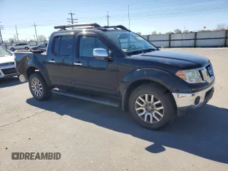 2011 Nissan Frontier Pro-4X with VIN 1N6AD0EV3BC437910, listed as a Copart auction lot 50757705 with 130,477 mi miles and Salvage title. Bid and sale history available at DreamBid. Image 4.