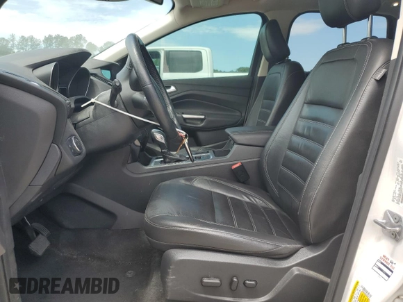2018 Ford Escape Titanium with VIN 1FMCU0J99JUA06741, listed as a Copart auction lot 55782195 with 103,392 mi miles and Salvage title. Bid and sale history available at DreamBid. Image 7.