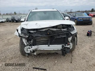 2023 Chevrolet Traverse High Country with VIN 1GNEVNKW8PJ318742, listed as a Copart auction lot 53361995 with 26,687 mi miles and Salvage title. Bid and sale history available at DreamBid. Image 5.