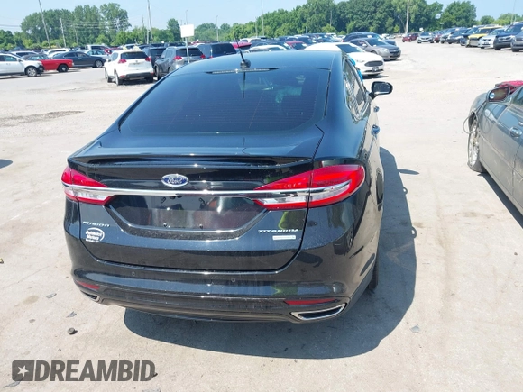 2017 Ford Fusion Titanium with VIN 3FA6P0K9XHR117300, listed as a IAAI auction lot 42731703 with 47,276 mi miles and . Bid and sale history available at DreamBid. Image 16.