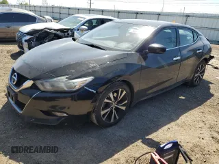 2018 Nissan Maxima Platinum z VIN 1N4AA6AP6JC404877, wystawiony jako Copart lot #56382855 z przebiegiem 160 034 mil mil oraz Szkoda całkowita • Salvage title. Historia ofert i sprzedaży dostępna na DreamBid. Obrazek 1.