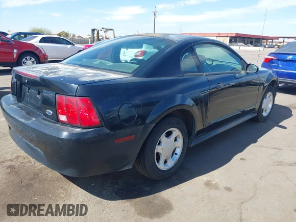 2001 Ford Mustang Standard with VIN 1FAFP40471F153561, listed as a IAAI auction lot 41650428 with 170,886 mi miles. Bid and sale history available at carsss.com. Image 4.