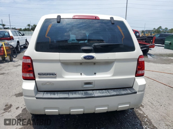 2011 Ford Escape XLS with VIN 1FMCU9C74BKC30951, listed as a Copart auction lot 57912165 with 159,079 mi miles and Salvage title. Bid and sale history available at DreamBid. Image 6.