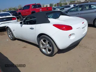 2006 Pontiac Solstice z VIN 1G2MB33B96Y101689, wystawiony jako IAAI lot #41891437 z przebiegiem 108 295 mil mil oraz . Historia ofert i sprzedaży dostępna na DreamBid. Obrazek 3.