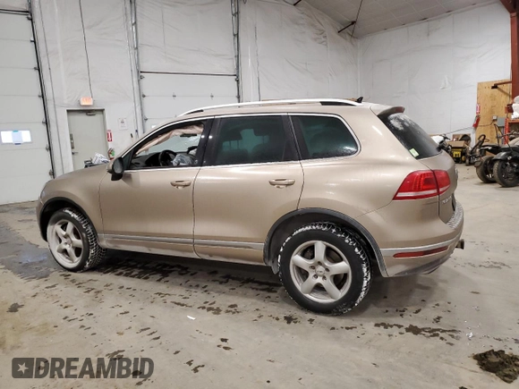 2016 Volkswagen Touareg Sport with VIN WVGEF9BP3GD010197, listed as a Copart auction lot 85826584 with 106,375 mi miles and Salvage Title. Bid and sale history available at DreamBid. Image 2.