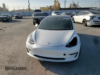 2021 Tesla Model 3 Standard Range Plus z VIN 5YJ3E1EA5MF018216, wystawiony jako Copart lot #52007385 z przebiegiem 49 711 mil mil oraz Szkoda całkowita • Salvage title. Historia ofert i sprzedaży dostępna na DreamBid. Obrazek 10.
