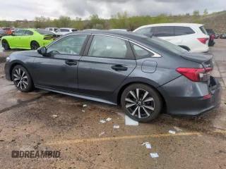 2023 Honda Civic EX z VIN 2HGFE1F73PH309295, wystawiony jako Copart lot #55631255 z przebiegiem 23 567 mil mil oraz Szkoda całkowita • Salvage title. Historia ofert i sprzedaży dostępna na DreamBid. Obrazek 2.