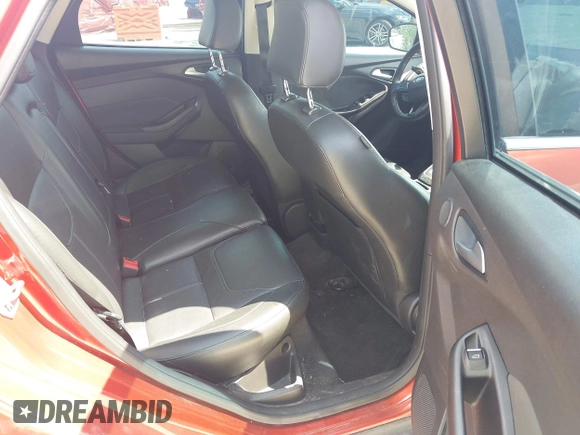 2018 Ford Focus Titanium z VIN 1FADP3J23JL295888, wystawiony jako IAAI lot #42524088 z przebiegiem 108 812 mil mil oraz . Historia ofert i sprzedaży dostępna na DreamBid. Obrazek 8.
