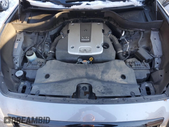 2015 Infiniti QX70 z VIN JN8CS1MW2FM481841, wystawiony jako Copart lot #41459505 z przebiegiem Nie podano mil oraz Szkoda całkowita • Salvage title. Historia ofert i sprzedaży dostępna na DreamBid. Obrazek 12.