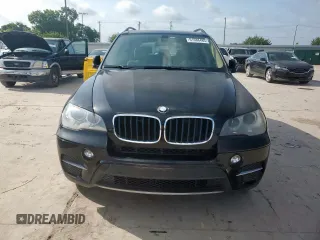 2012 BMW X5 35i с VIN 5UXZV4C52CL988794, выставлен на аукционе Copart как лот 61688485 с пробегом Не указан миль и Чистый • Clean title. История ставок и продаж доступна на DreamBid. Изображение 5.