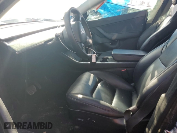 2021 Tesla Model Y Long Range with VIN 5YJYGDEE0MF088159, listed as a Copart auction lot 88668465 with 131,414 mi miles and Salvage Title. Bid and sale history available at DreamBid. Image 7.