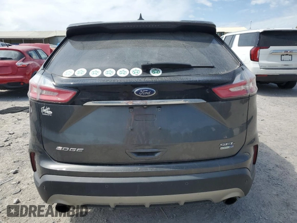 2019 Ford Edge SEL with VIN 2FMPK4J90KBB11769, listed as a Copart auction lot 53610965 with 129,524 mi miles and Salvage Title. Bid and sale history available at carsss.com. Image 6.