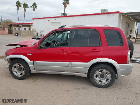 2004 Suzuki Grand Vitara with VIN JS3TE62V344100216, listed as a IAAI auction lot 41734638 with 213,166 mi miles. Bid and sale history available at carsss.com. Image 15.