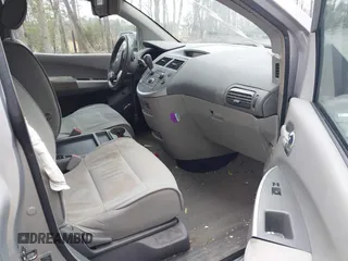 2009 Nissan Quest SL with VIN 5N1BV28U59N105982, listed as a IAAI auction lot 41795063 with 127,008 mi miles. Bid and sale history available at carsss.com. Image 5.