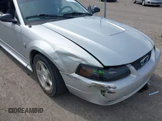 2004 Ford Mustang Standard z VIN 1FAFP40494F117830, wystawiony jako IAAI lot #42212706 z przebiegiem 160 172 mil mil oraz . Historia ofert i sprzedaży dostępna na DreamBid. Obrazek 6.