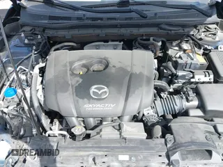 2016 Mazda 6 i Grand Touring with VIN JM1GJ1W59G1439075, listed as a IAAI auction lot 41792755 with 99,215 mi miles and . Bid and sale history available at DreamBid. Image 10.