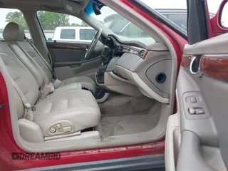 2002 Cadillac DeVille with VIN 1G6KD57YX2U257123, listed as a IAAI auction lot 41952025 with 180,278 mi miles. Bid and sale history available at carsss.com. Image 5.