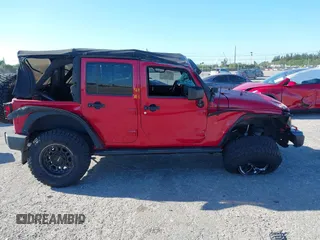 2008 Jeep Wrangler Unlimited X with VIN 1J4GB391X8L649234, listed as a IAAI auction lot 41837164 with 154,035 mi miles and . Bid and sale history available at DreamBid. Image 13.
