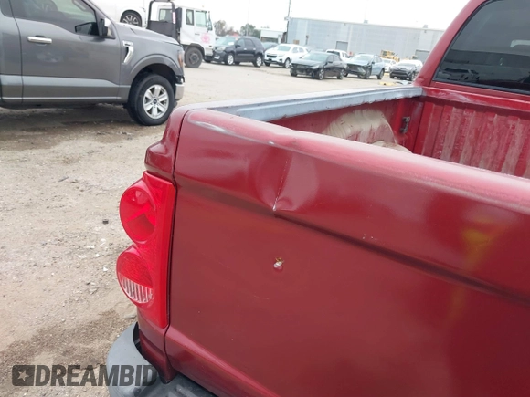 2006 Dodge Dakota SLT with VIN 1D7HE48KX6S598831, listed as a IAAI auction lot 41292884 with 173,181 mi miles and . Bid and sale history available at carsss.com. Image 20.