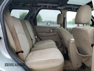 2005 Mercury Mariner Luxury z VIN 4M2CU56185DJ12005, wystawiony jako Copart lot #73570914 z przebiegiem 185 354 mil mil oraz Tytuł czysty. Historia ofert i sprzedaży dostępna na DreamBid. Obrazek 11.