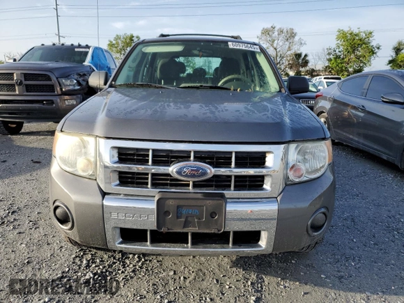 2009 Ford Escape XLS with VIN 1FMCU92749KB94402, listed as a Copart auction lot 60975645 with 171,202 mi miles and Clean title. Bid and sale history available at DreamBid. Image 5.
