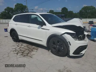 2023 Volkswagen Tiguan SE R-Line Black z VIN 3VVCB7AX0PM006045, wystawiony jako Copart lot #59591775 z przebiegiem 44 155 mil mil oraz Szkoda całkowita • Salvage title. Historia ofert i sprzedaży dostępna na DreamBid. Obrazek 4.