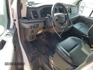 2021 Ford Transit Cargo with VIN 1FTBR1C85MKA81464, listed as a Copart auction lot 53979985 with 90,127 mi miles and Salvage Title. Bid and sale history available at DreamBid. Image 8.