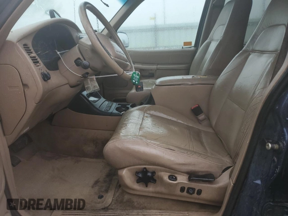 2000 Ford Explorer Eddie Bauer with VIN 1FMZU74E3YZA26797, listed as a Copart auction lot 53163865 with 297,314 mi miles and Clean title. Bid and sale history available at DreamBid. Image 7.