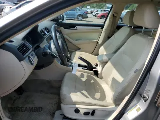 2013 Volkswagen Passat SE with VIN 1VWBH7A32DC150809, listed as a Copart auction lot 58417065 with 220,146 mi miles and Salvage title. Bid and sale history available at DreamBid. Image 7.