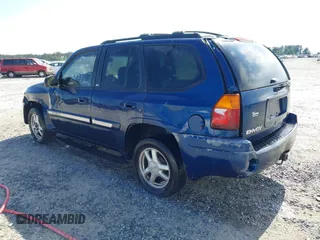 2003 GMC Envoy SLE z VIN 1GKDS13S032346173, wystawiony jako IAAI lot #42142925 z przebiegiem 304 447 mil mil oraz . Historia ofert i sprzedaży dostępna na DreamBid. Obrazek 3.