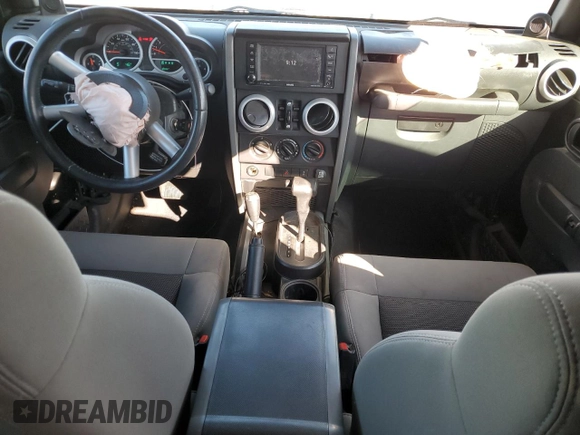2010 Jeep Wrangler Unlimited Sahara with VIN 1J4BA5H17AL123479, listed as a Copart auction lot 49066315 with 114,419 mi miles and Salvage Title. Bid and sale history available at carsss.com. Image 8.
